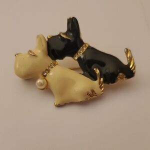 Elegant Black and Cream Dog Brooch